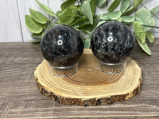 Garnet and Strophiolate Spheres