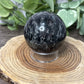 Garnet and Strophiolate Spheres