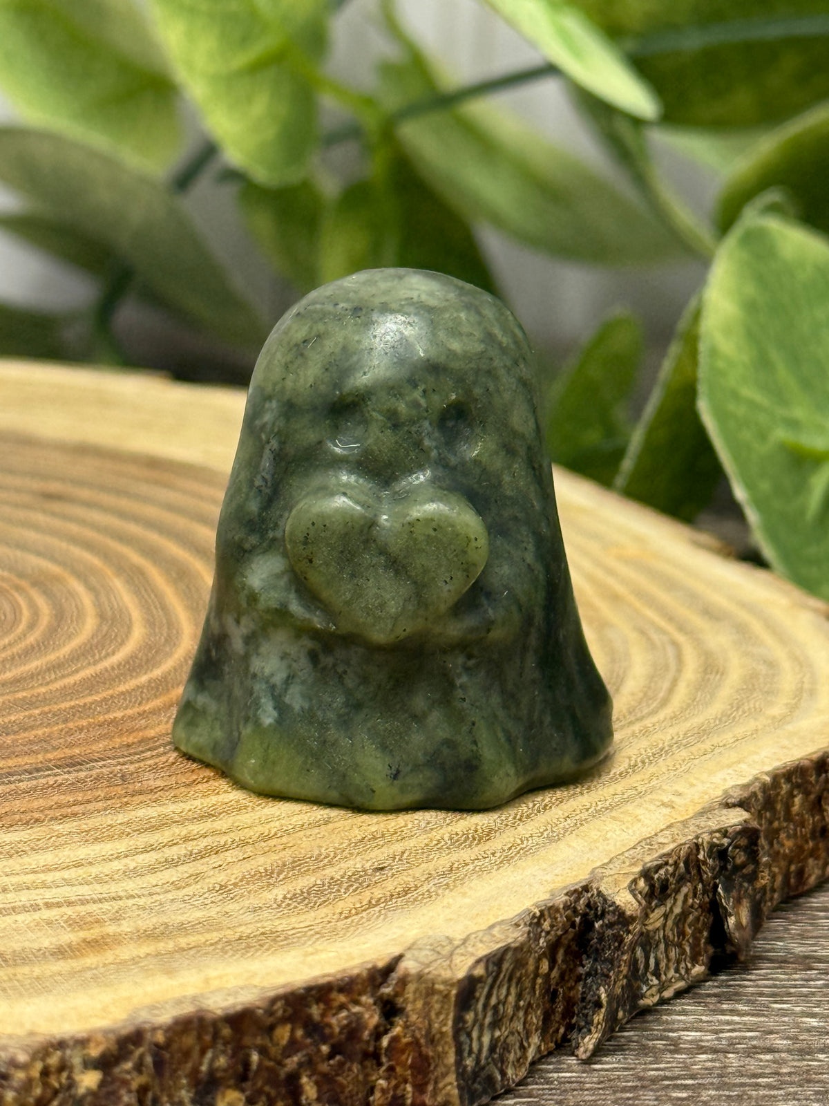 Crystal Ghost Carving Holding A Heart