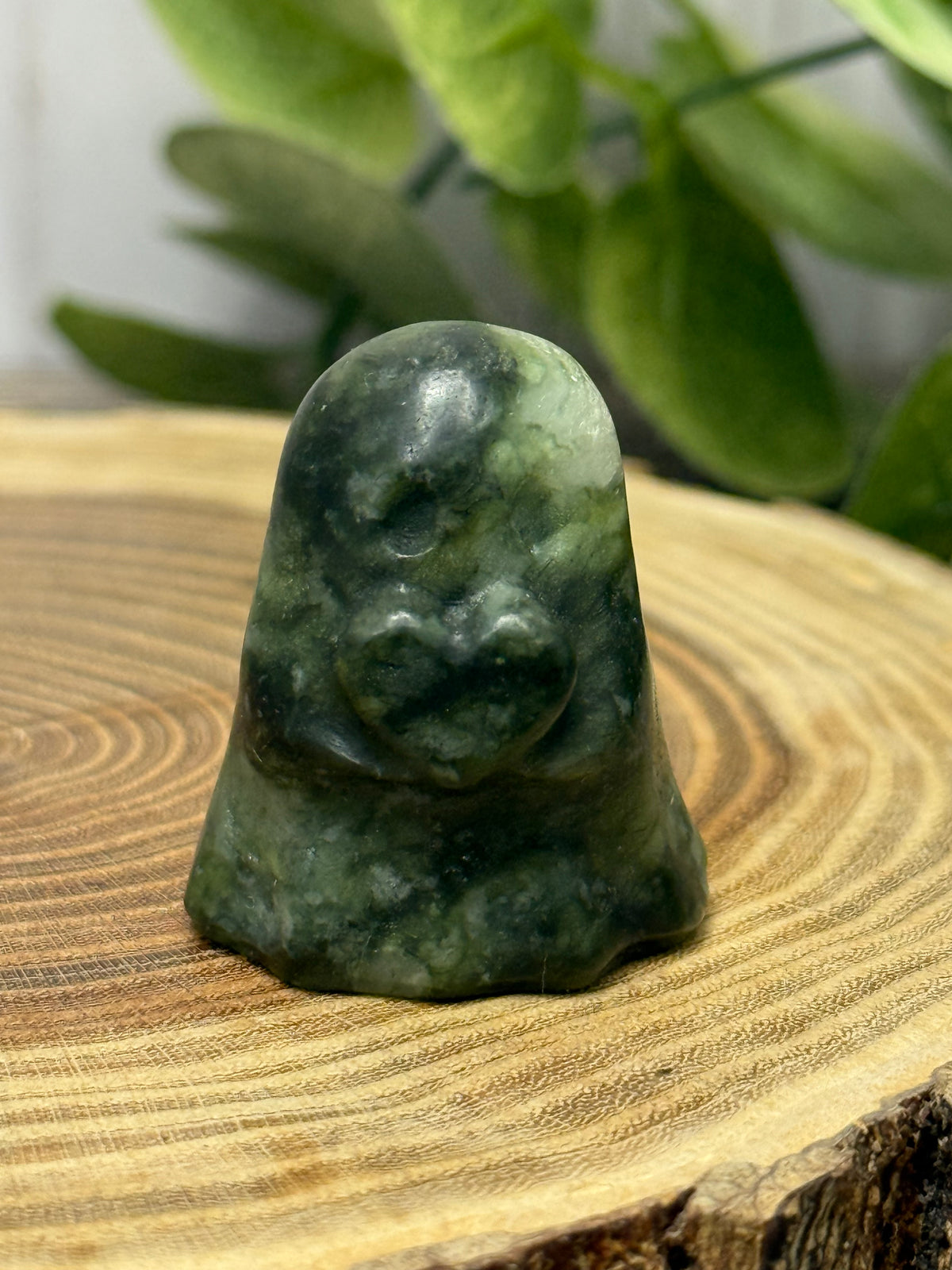 Crystal Ghost Carving Holding A Heart