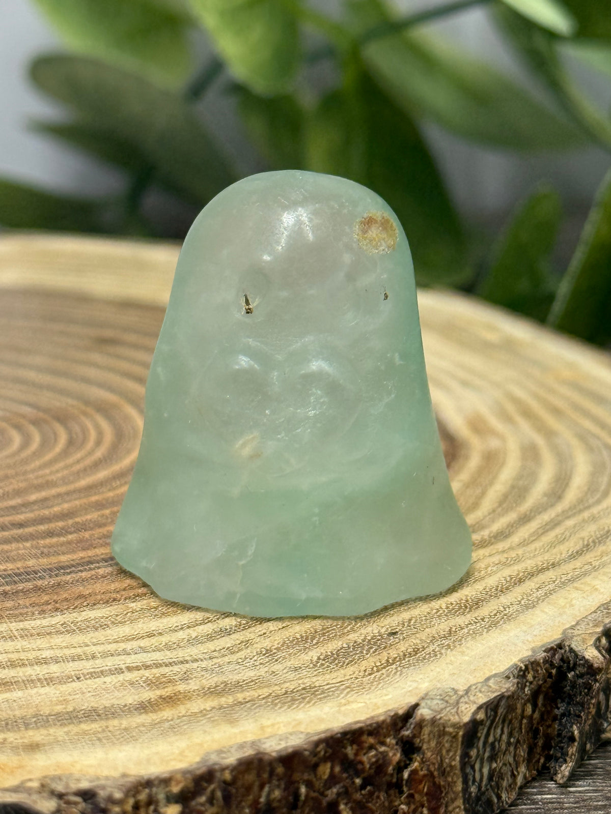 Crystal Ghost Carving Holding A Heart