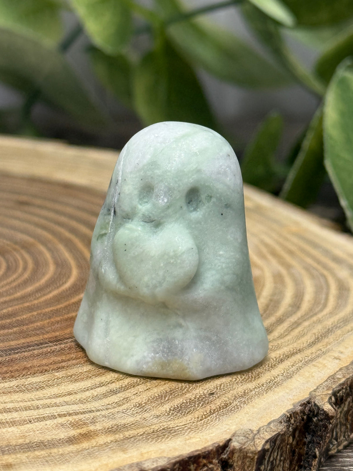 Crystal Ghost Carving Holding A Heart