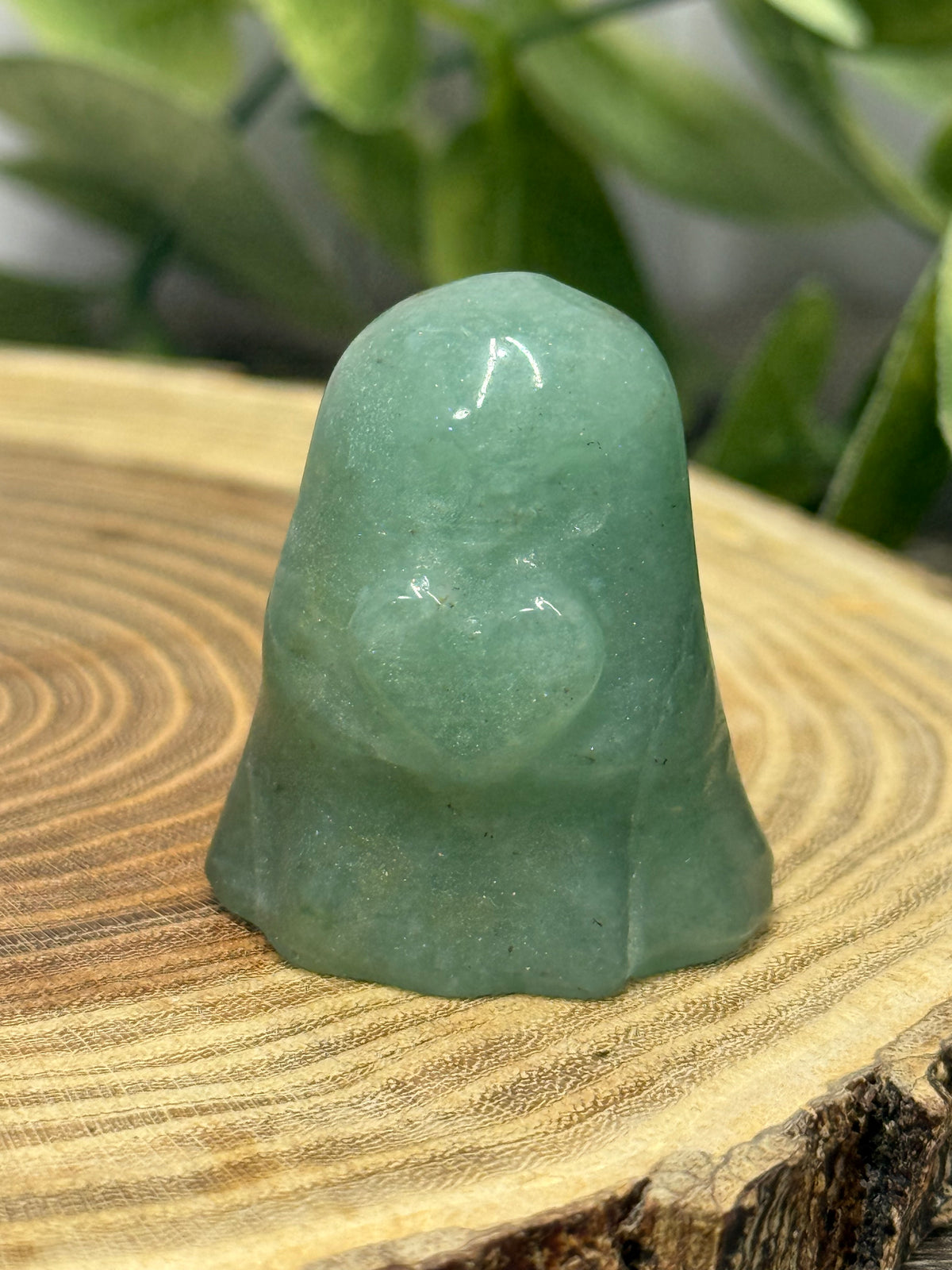 Crystal Ghost Carving Holding A Heart