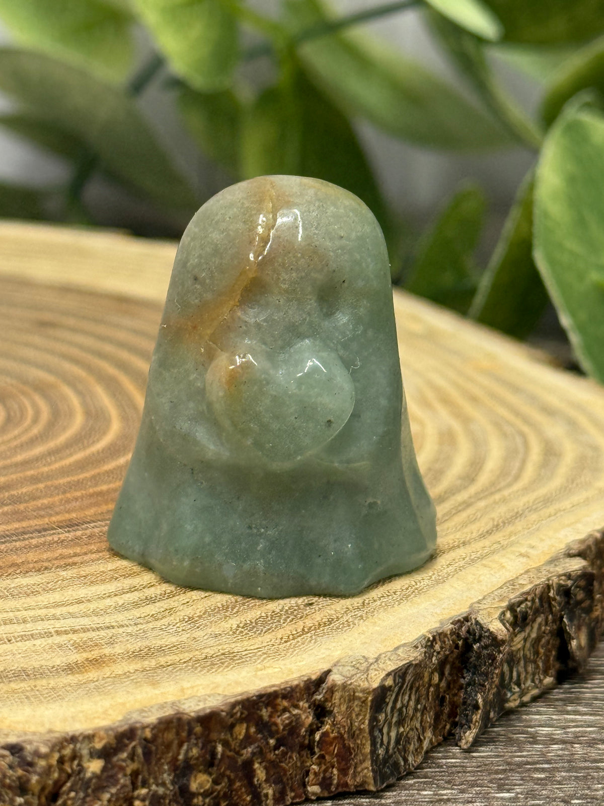 Crystal Ghost Carving Holding A Heart