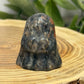 Crystal Ghost Carving Holding A Heart