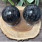 Garnet and Strophiolate Spheres