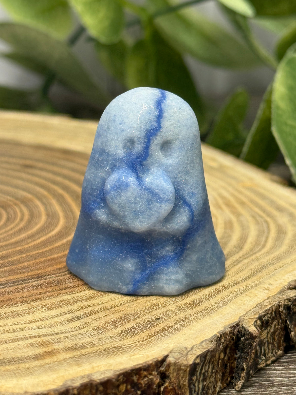 Crystal Ghost Carving Holding A Heart