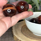 Red Tigers Eye Small Spheres